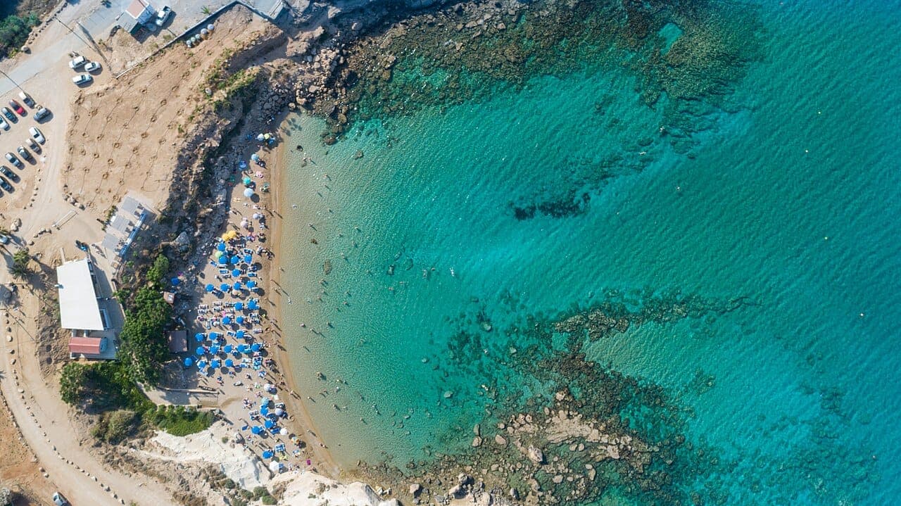 Aerial view of Kapparis bay, the cove at Fireman's Beach (Asprokremmos), Cyprus